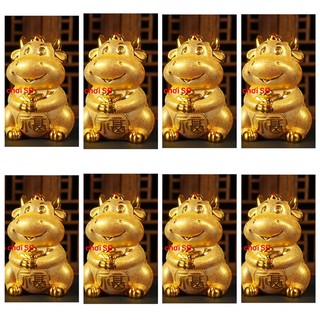 ống heo - hình con trâu vàng
