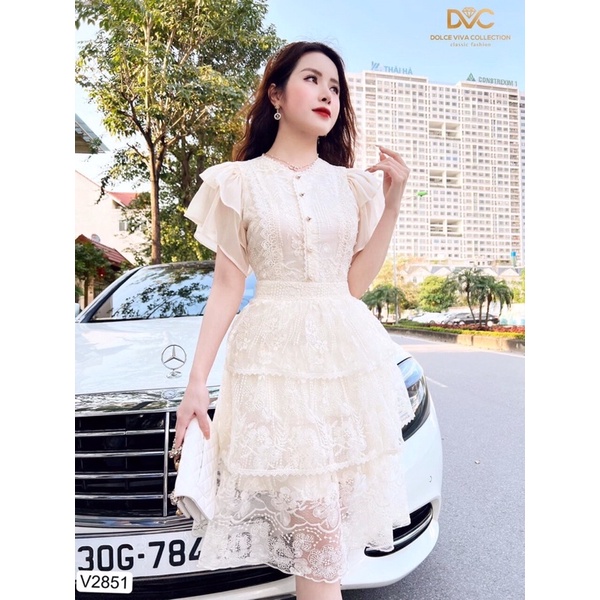 V2851 váy ren xếp tầng màu kem