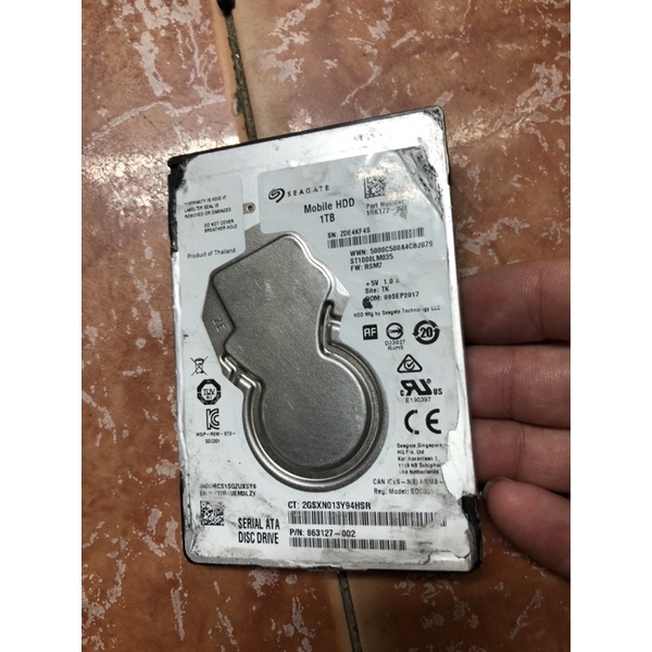 xác hdd laptop segate 1tb slim cho ae lấy boad mạch cứu dữ liệu, ko bảo hành