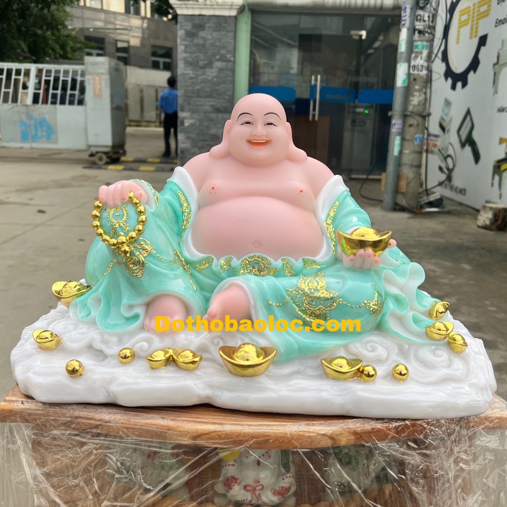 Tượng phật di lặc cầm thỏi vàng bằng đá nhập khẩu ngang 40cm cao 25cm – Xanh
