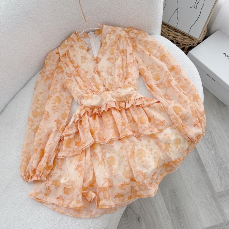 Đầm hoa cam tay dài xòe tầng bèo gài nút đôi