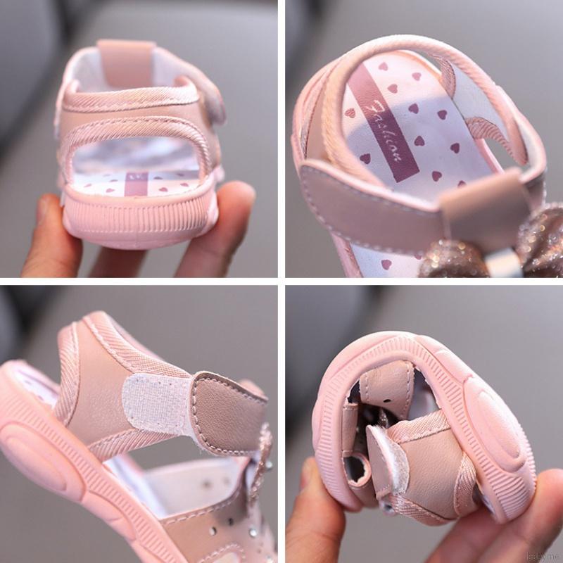 Giày sandal đế mềm chống trượt đính nơ cho bé gái