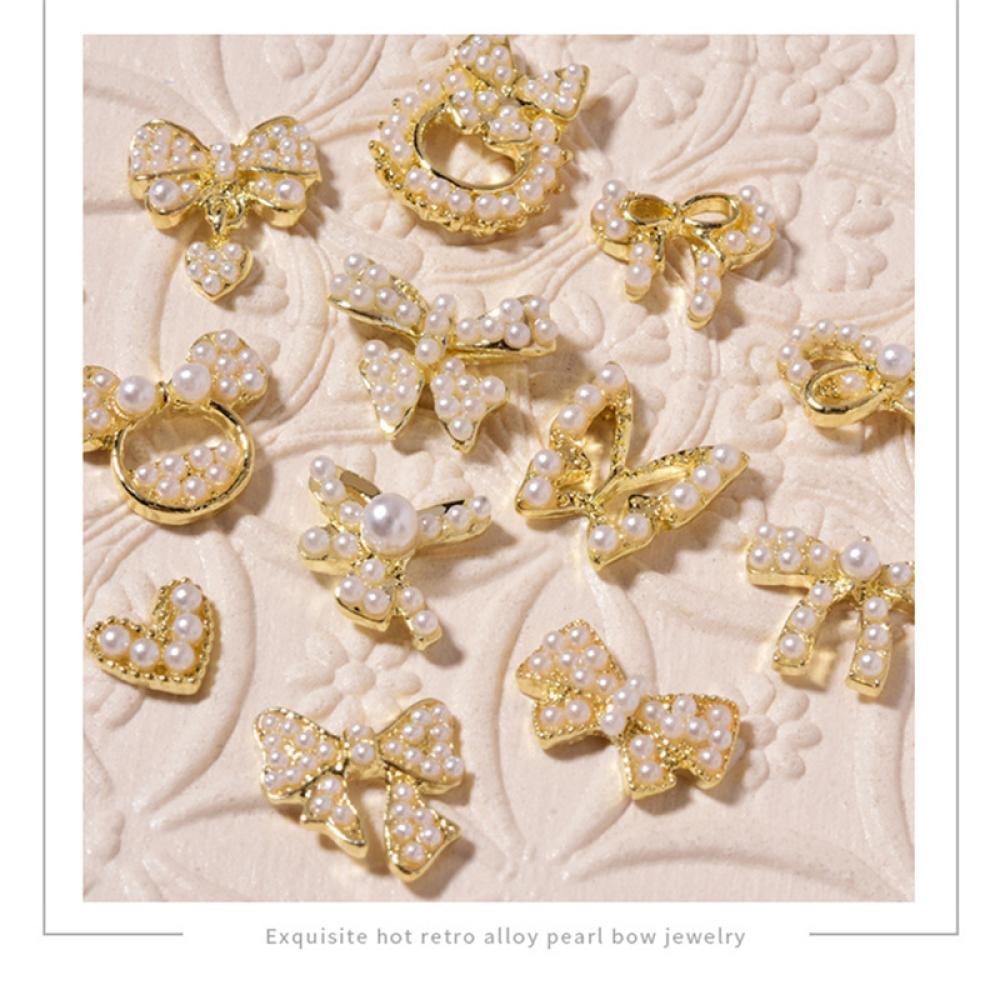 Phụ Kiện Trang Trí Móng Tay Nghệ Thuật Bằng Hợp Kim Hình Nơ Đính Đá Và Ngọc Trai T2X2