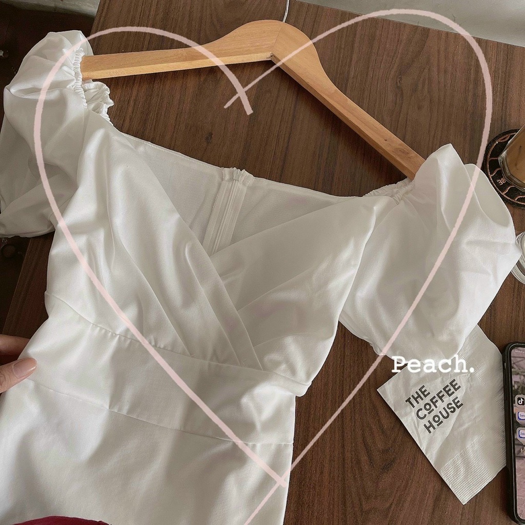 ĐẦM TRẮNG CHÉO CỔ V TAY PHỒNG VIBED