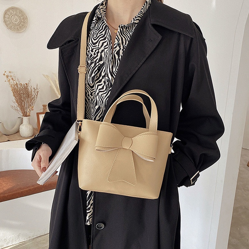 Túi Xách Da Cầm Tay Phối Nơ Xinh Xắn