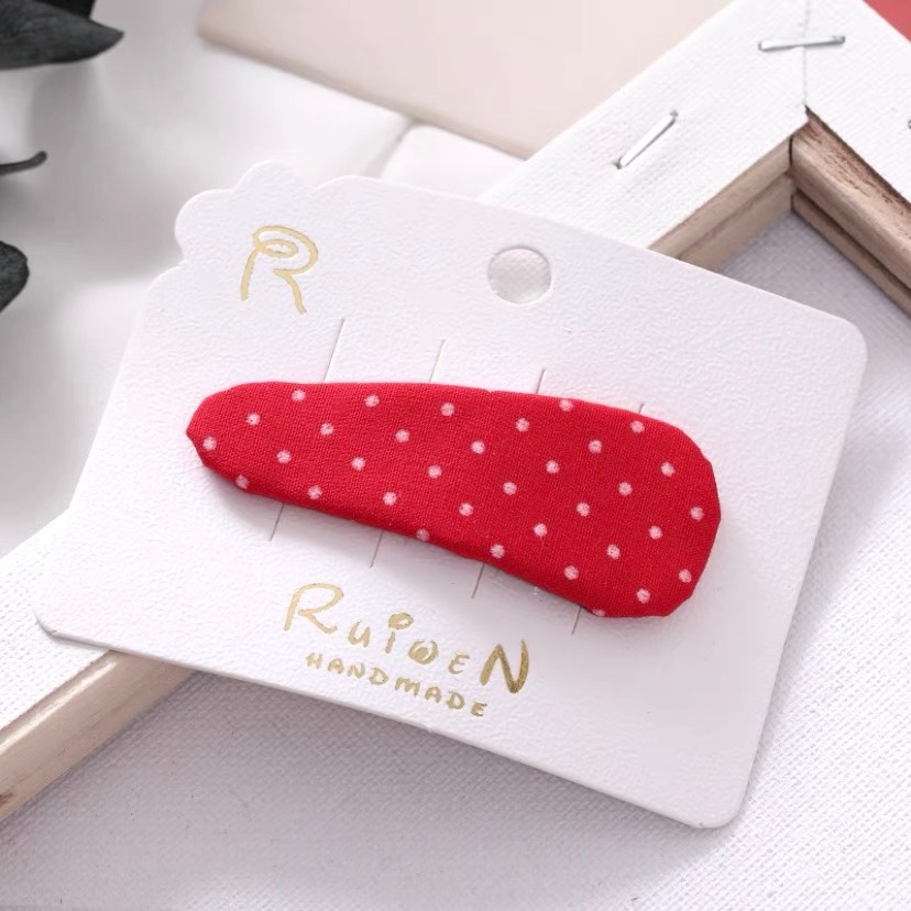 Kẹp tóc dài họa tiết chấm bi và kẻ cho bé gái