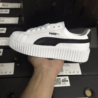 Giày sneaker đế cao hộp cứng