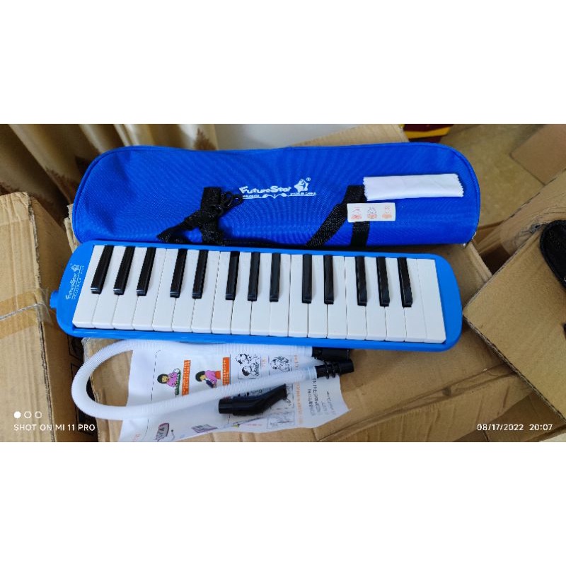Khăn lau + sticker đáng yêu cho kèn melodica