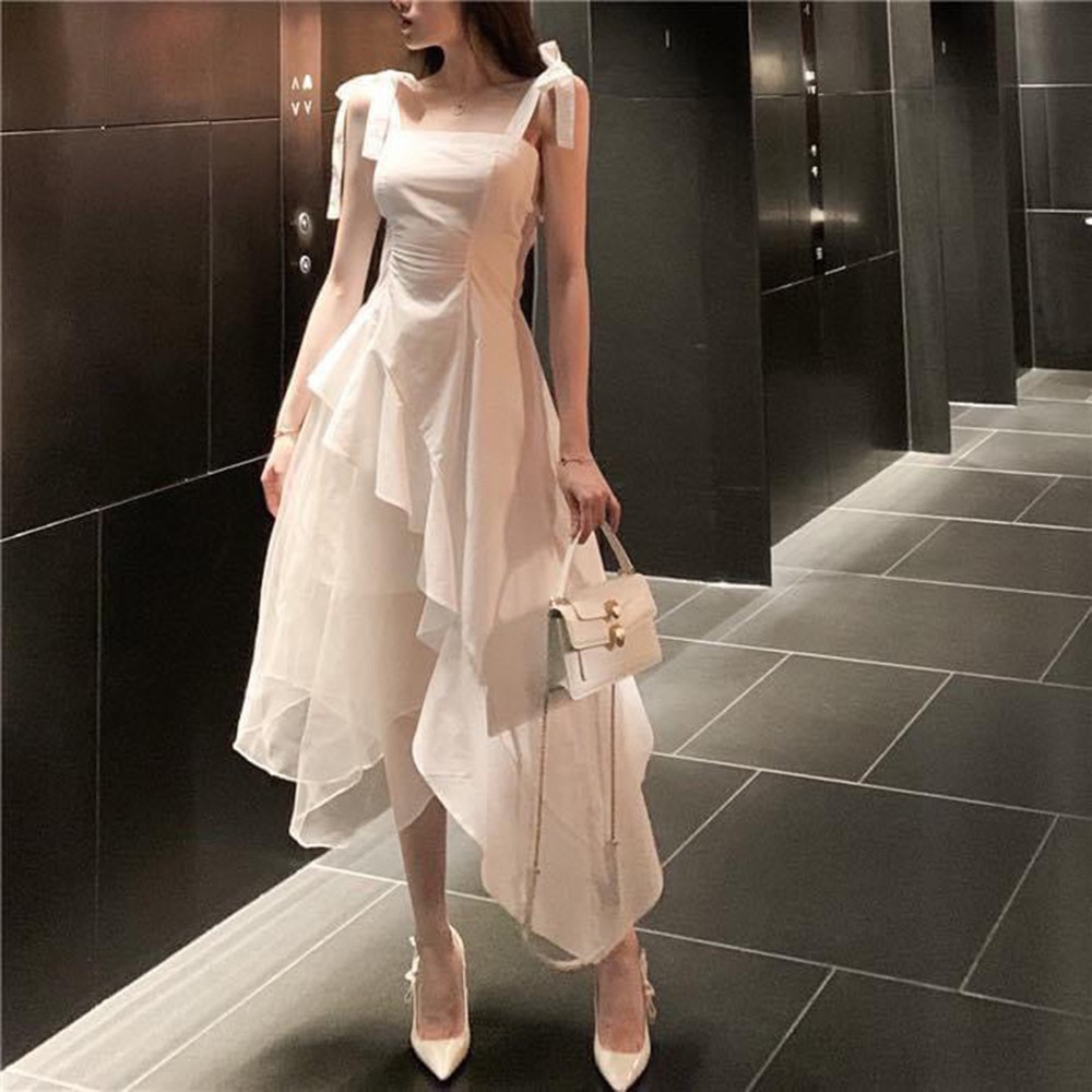 Đầm váy nữ màu trắng dáng xòe 2 dây dễ thương cột nơ vai lệch tà cá tính thời trang XUKA-DRESS MT004 thiết kế đẹp