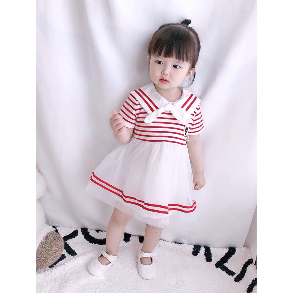 Váy cotton cổ sen có nơ cách điệu cho bé