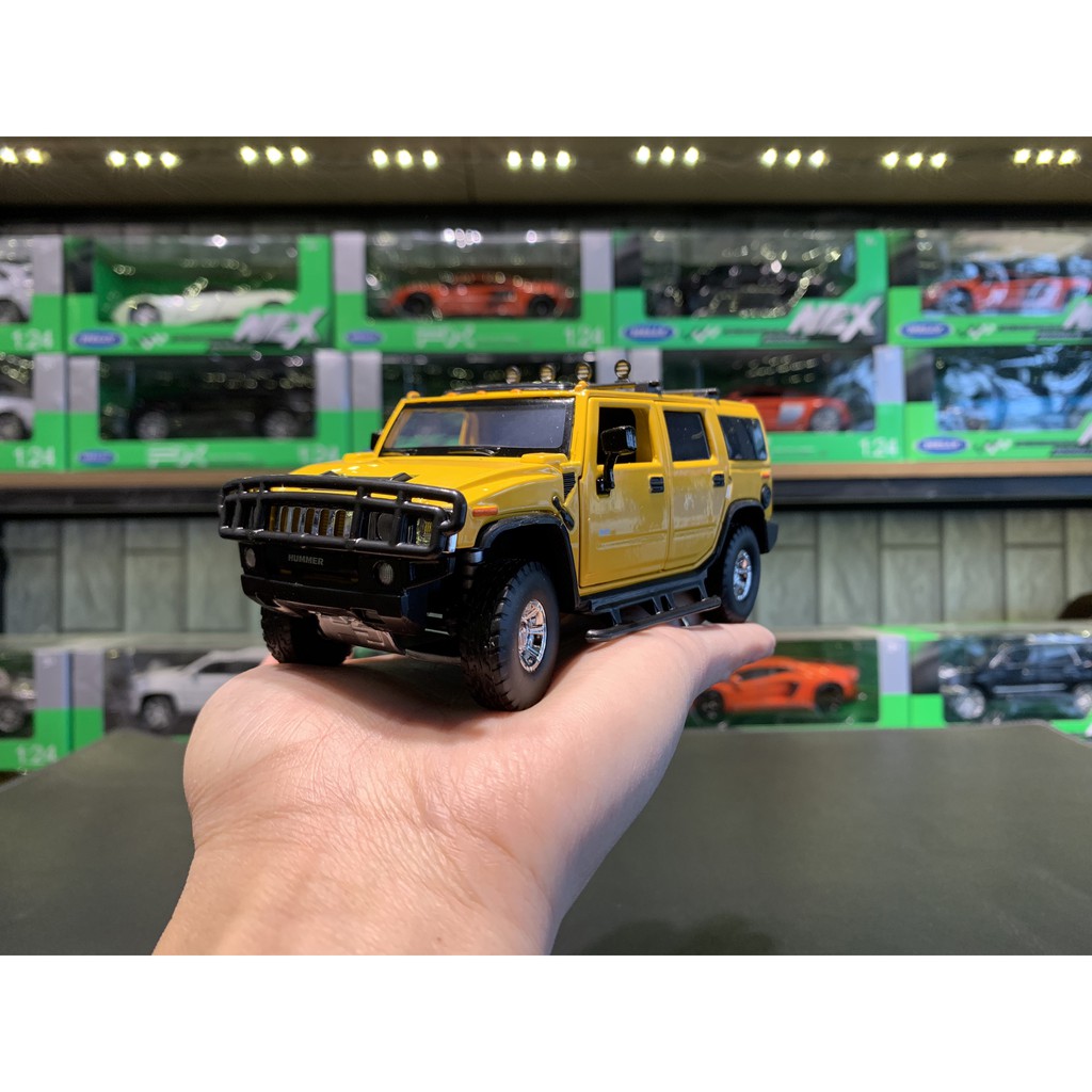 Mô hình xe Hummer H2 tỉ lệ 1:32 của hãng Jackiekim (4 Màu )