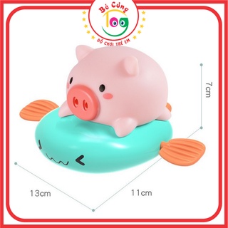 Đồ Chơi Nhà Tắm Vặn Cót Heo Cưỡi Cá Lướt Sóng Phun Nước Vui Nhộn Dành Cho Bé