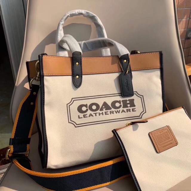 Túi Coach vải bố phối da