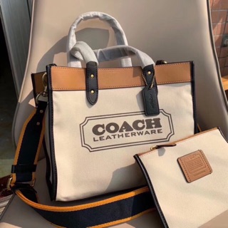 Túi Coach vải bố phối da