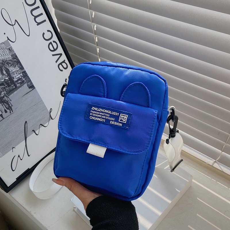 Túi Đeo Chéo Dáng Vuông Nhỏ Chất Liệu Nilon Màu Xanh Dương Mẫu Mới
