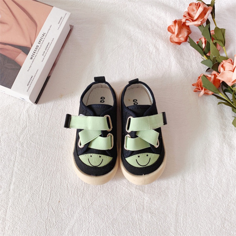 Giày Thể Thao Vải Canvas Khóa Dán Họa Tiết Mặt Cười Hoạt Hình Dễ Thương Cho Bé