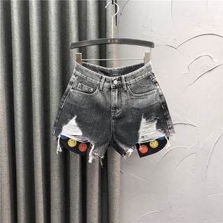 Quần short denim lưng cao phối túi thiết kế xẻ rách cá tính