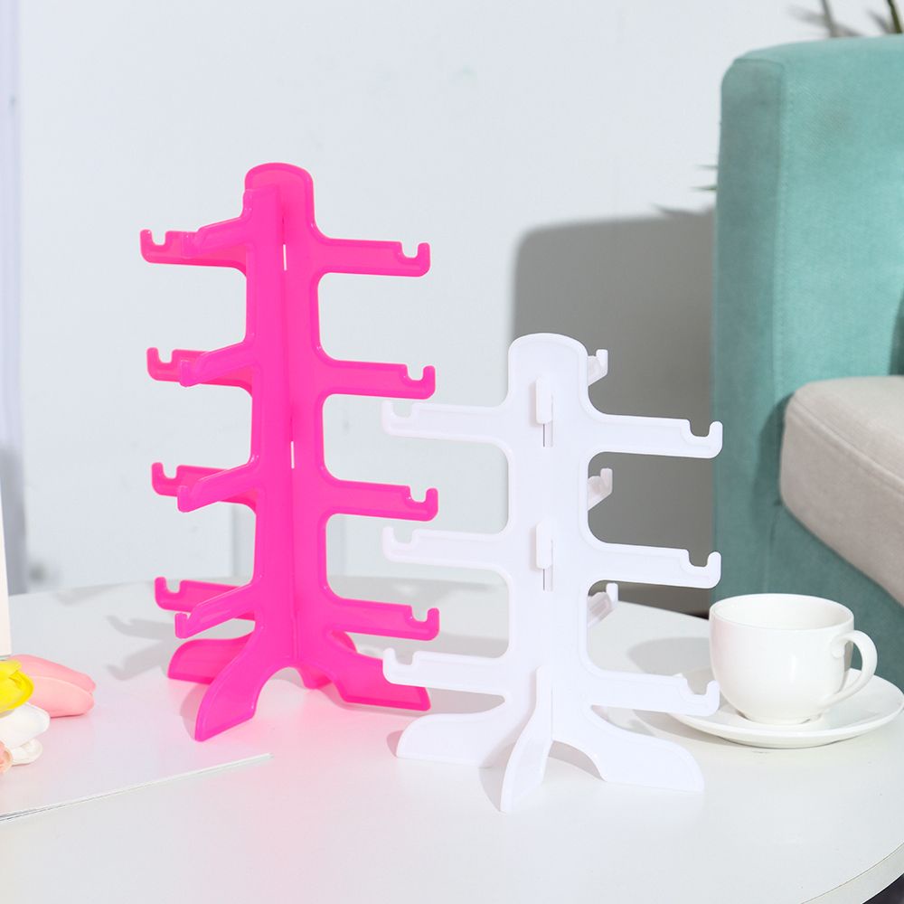 Giá đỡ trưng bày mắt kính nhựa nhiều màu tiết kiệm không gian