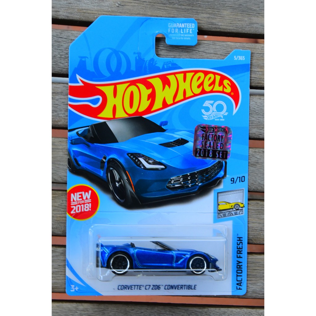 Ô tô mô hình tỉ lệ 1:64 Hot Wheels tem Factory Sealed Corvette C7 Z06 Convertible ( màu xanh )