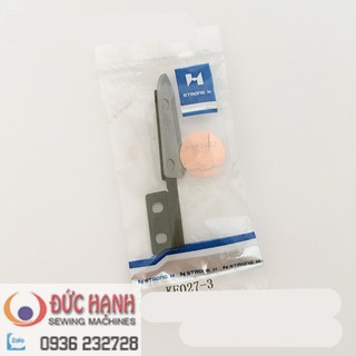 Dao cắt dưới máy cắt đầu bàn