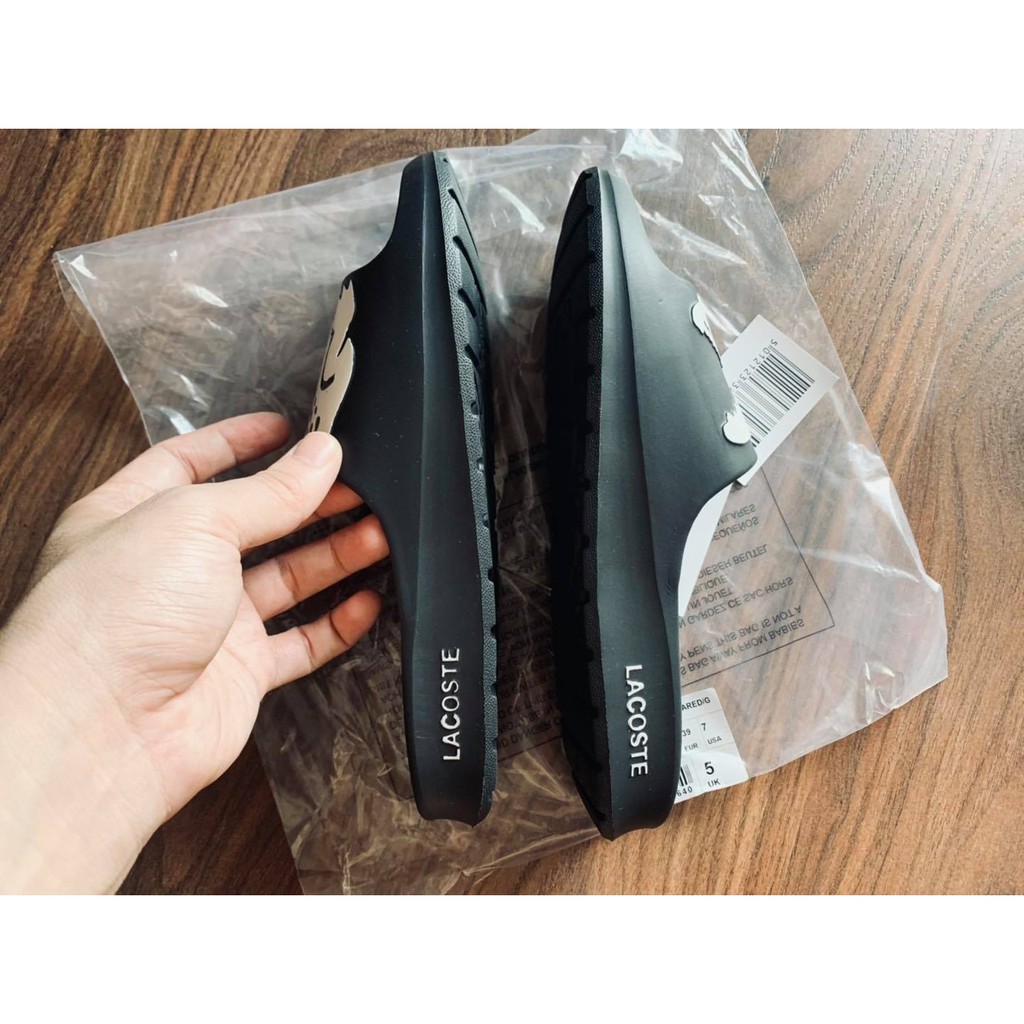 Dép đúc đen in cá trắng