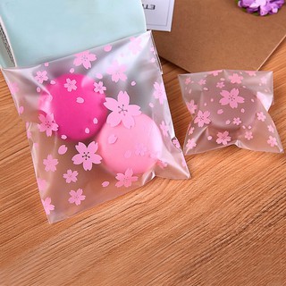 (Set 100) Túi đựng bánh quy dán mép hoa anh đào