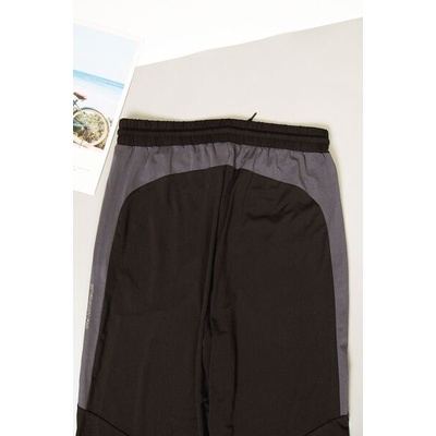 Quần thể thao dây rút Komont