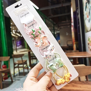 Buộc tóc hoạt hình cho bé