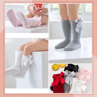 Tất nơ cao đến đầu gối cho bé gái