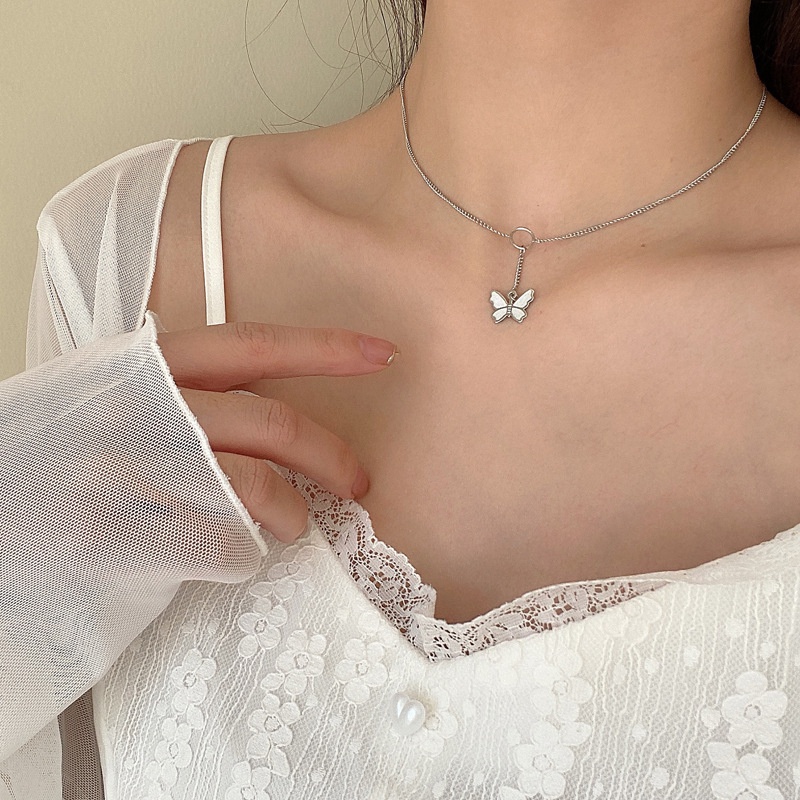 Vòng cổ Mặt Hình Bướm Tua Rua Màu Bạc Thời Trang Hàn Quốc Dành Cho Nữ
