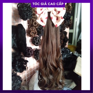 Tóc cột xoăn dài kèm nơ