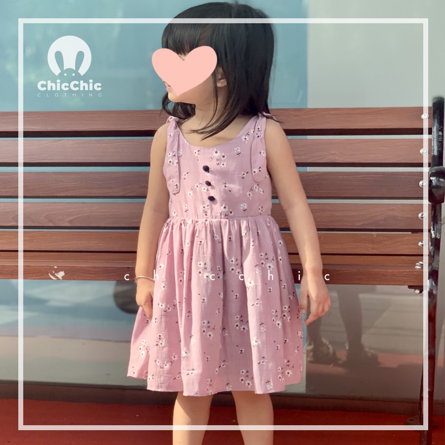 Đầm hồng tím hoa nhí cột nơ vai cho bé