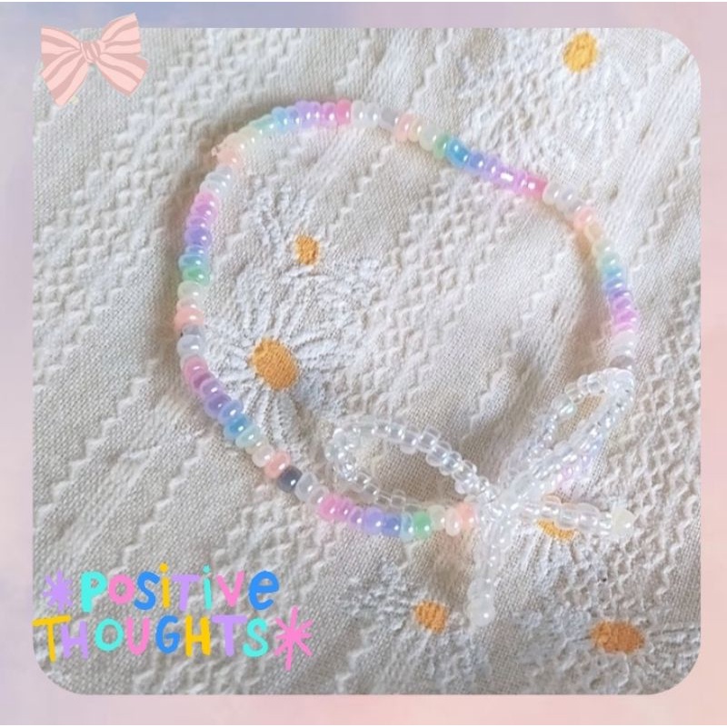 Vòng tay hạt cườm handmade màu pastel hình nơ (đọc kĩ phần mô tả để nhận quà cho mỗi đơn hàng)