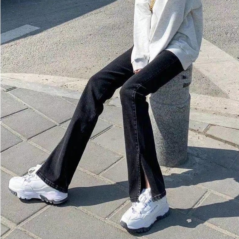 Quần Jean Dài Lưng Cao Ống Loe Xẻ Tà Màu Đen Thời Trang Mùa Thu Cá Tính Cho Nữ