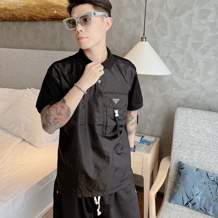 Áo polo Prada pha da túi ngực LA