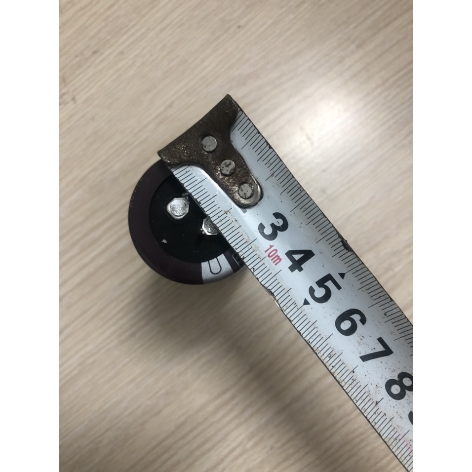 TỤ LỌC NGUỒN AMPLY 100V- 10000 µF NÂU