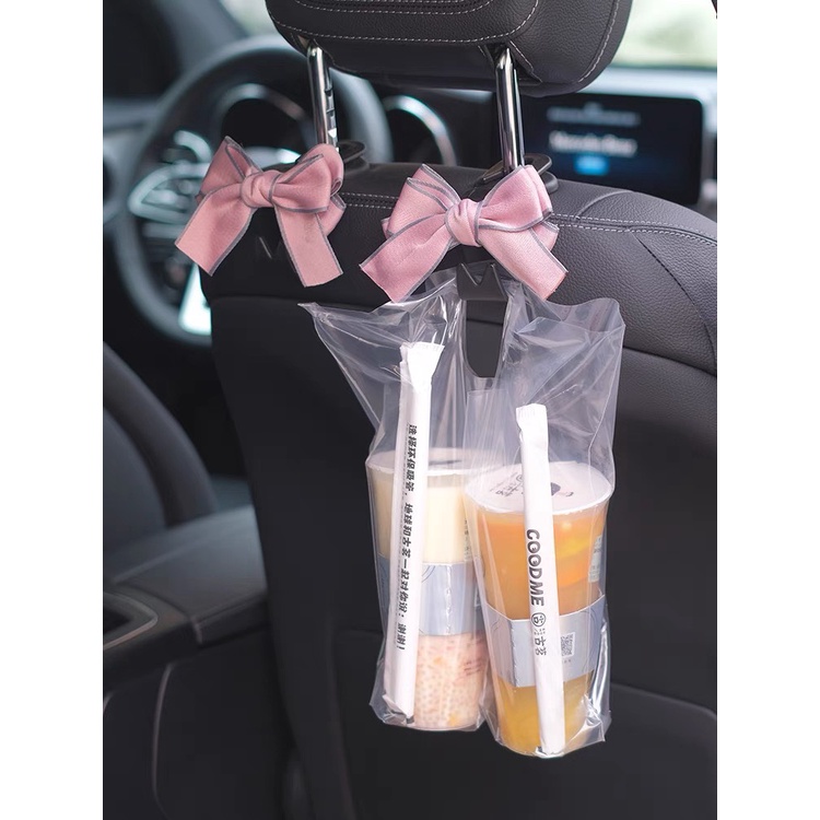 Móc treo đồ sau ghế xe ô tô - Móc treo đồ xe hơi hình nơ