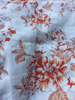 Vải linen bột hoa mẫu đơn màu cam đất.