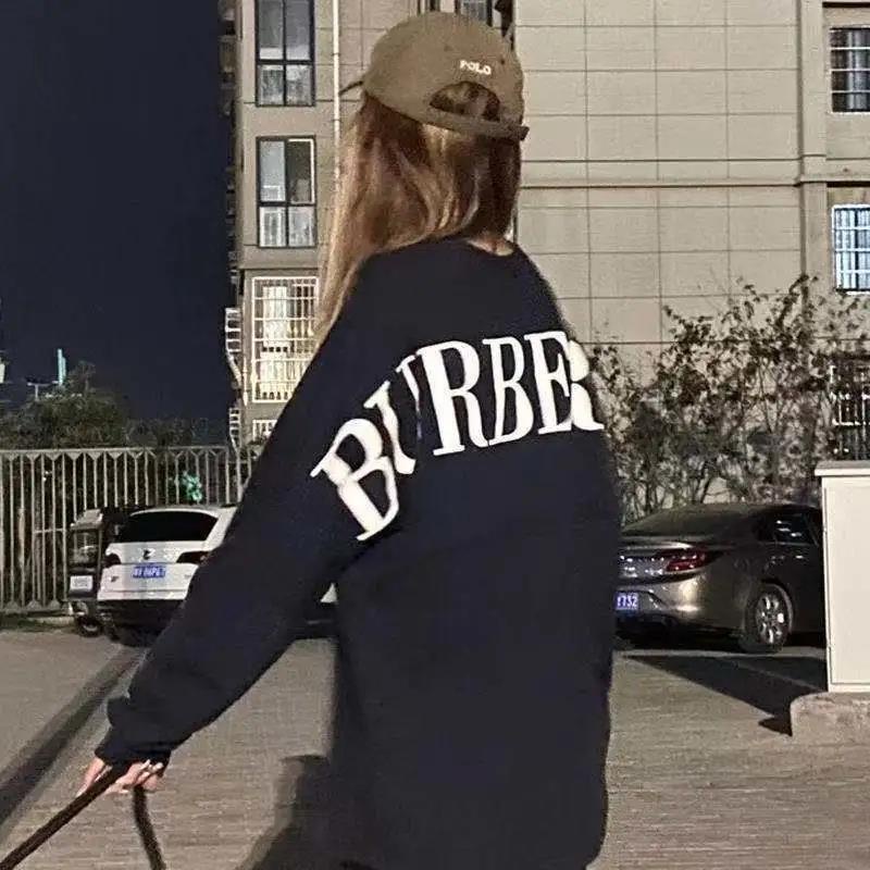 Áo thun COZOK tay dài form rộng in chữ phong cách hip hop