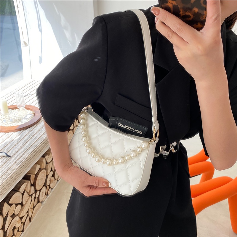 Túi xách nữ đeo vai trần chỉ trám kèm dây giả ngọc hàng hot hit Capucha T56