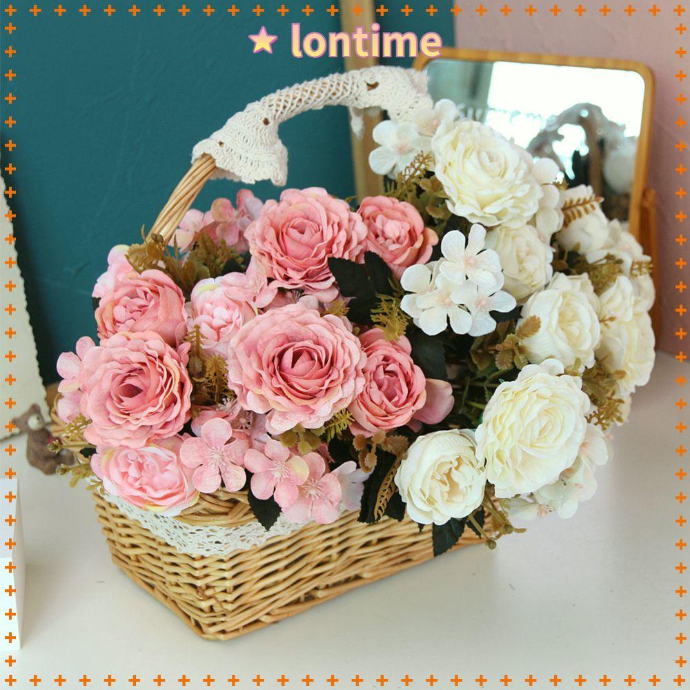 Bó hoa hồng giả bằng lụa dùng trang trí đám cưới