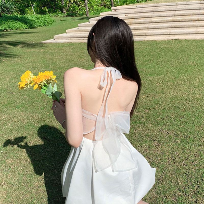 Váy ngọt ngào mới mùa hè, váy ngắn hở lưng màu trắng kiểu Pháp với dây treo