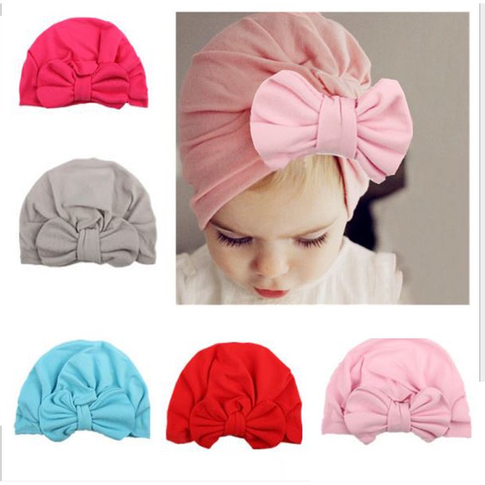 Mũ turban thắt nơ và hoa cho bé gái