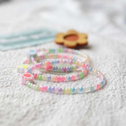Vòng tay hạt cườm màu pastel charm bàn chân pet đáng yêu