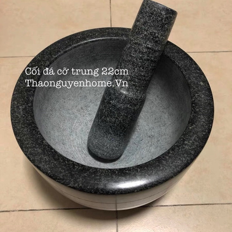 Cối đá tảng nguyên khối nặng trịch