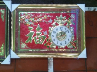 Tranh đồng hồ bằng đồng