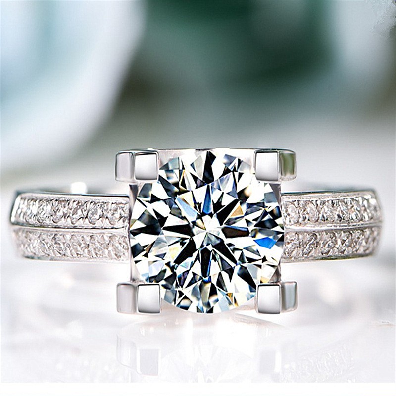 Nhẫn đính hôn kim cương vàng trắng thiết kế sang trọng cho nữ