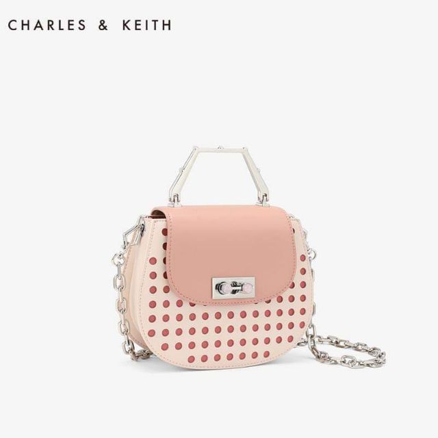 Horse shoe top handle bag by charles and keith