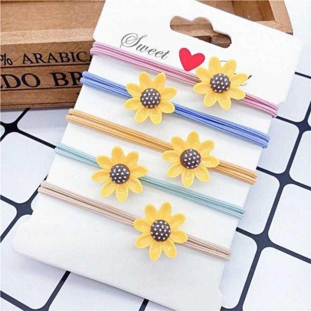 Cột tóc hoa hướng dương