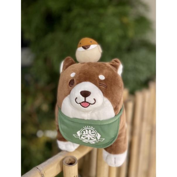 Gấu bông chó Shiba nâu đậm nháy mắt đội chim 25-30cm